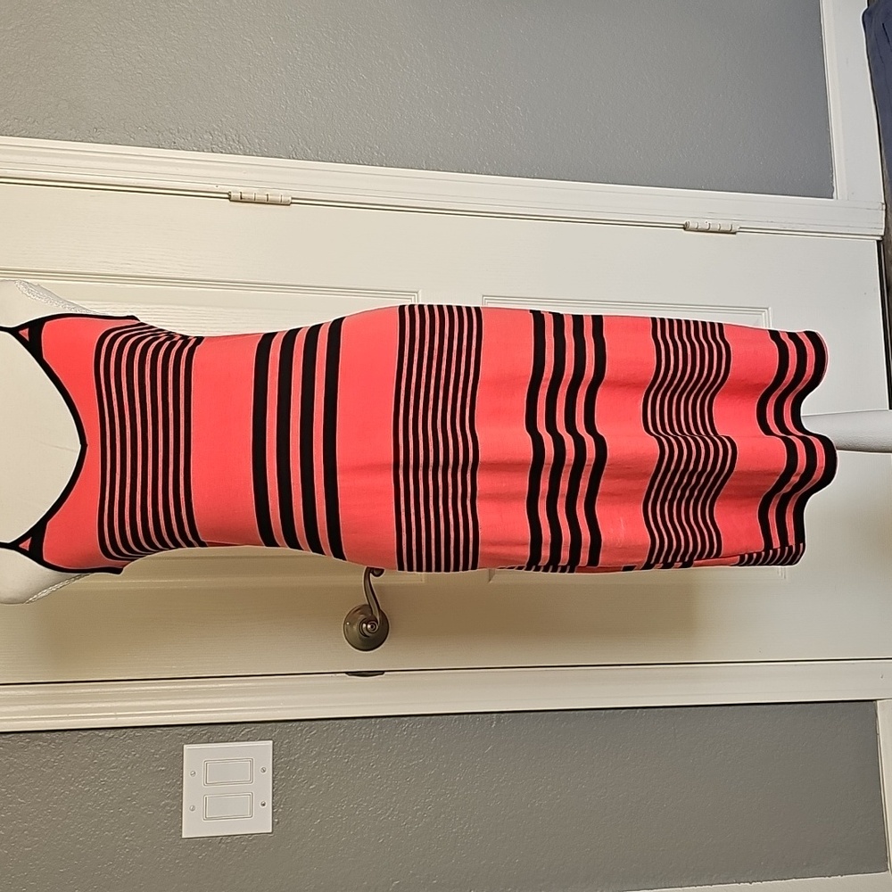 Orange and blacked striped dress